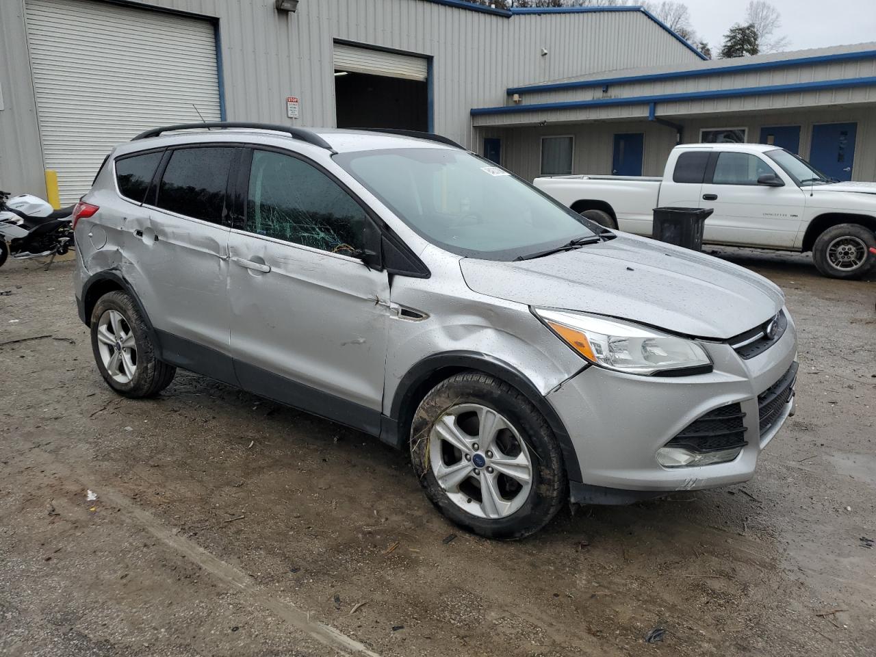 VIN 1FMCU9GX7GUA94837 2016 FORD ESCAPE no.4