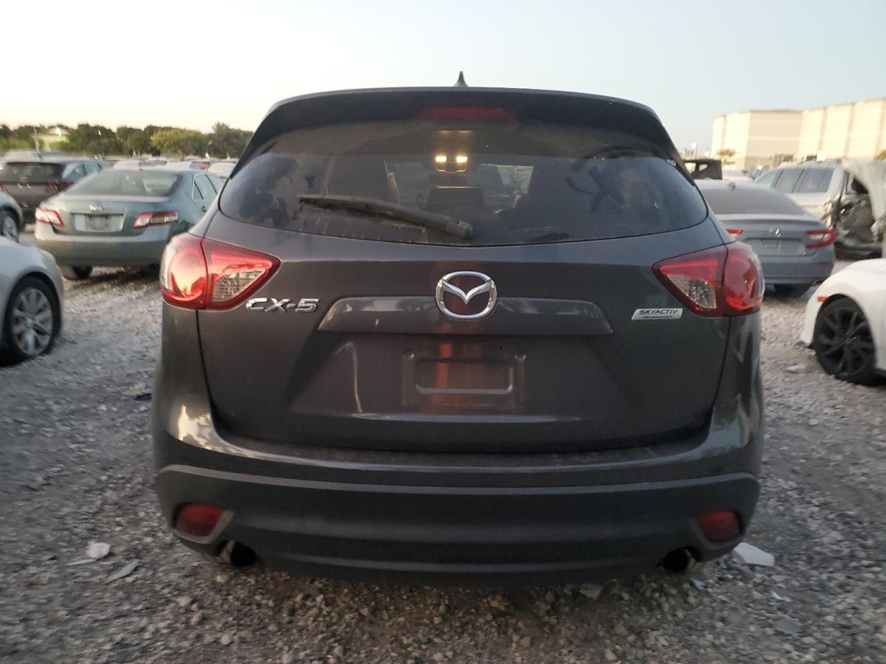 2016 Mazda Cx-5 Touring VIN: JM3KE2CY2G0877131 Lot: 83357494