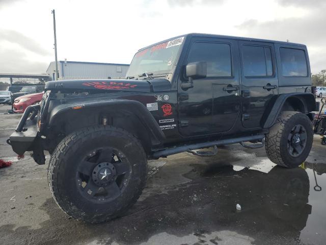 2013 Jeep Wrangler Unlimited Sport na sprzedaż w Orlando, FL - Front End