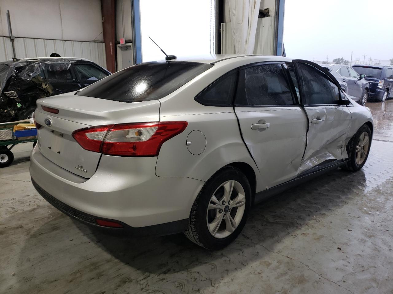 VIN 1FADP3F21EL175733 2014 FORD FOCUS no.3