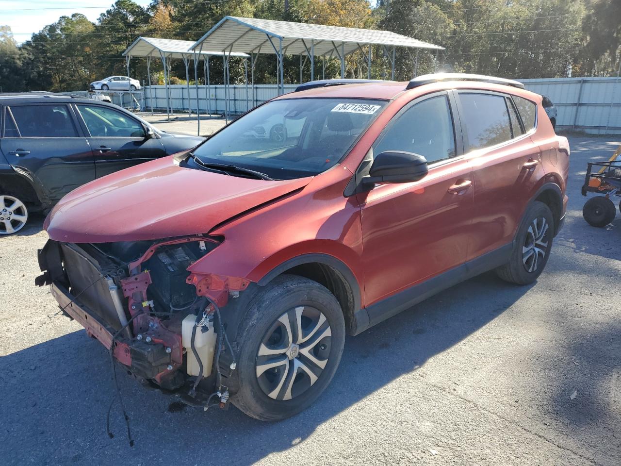 2017 Toyota Rav4 Le red null gas JTMZFREV9HJ133120 photo #1