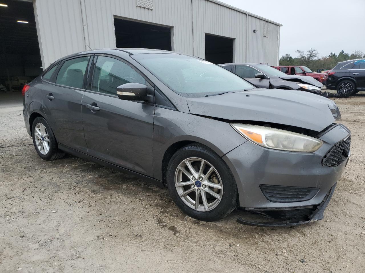 VIN 1FADP3F25GL217971 2016 FORD FOCUS no.4