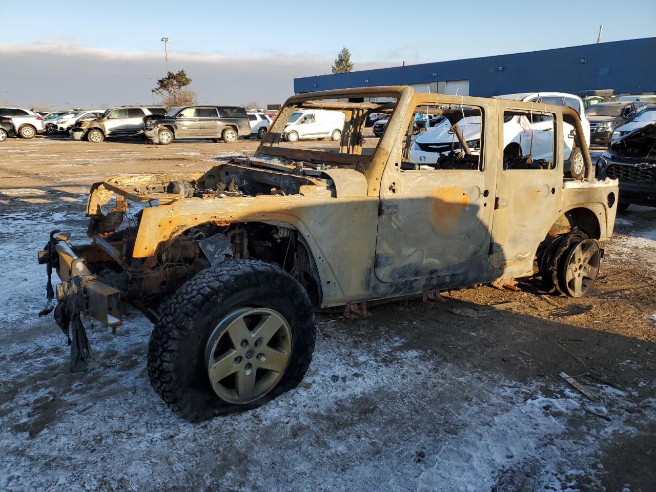 2013 Jeep Wrangler Unlimited Sport na sprzedaż w Woodhaven, MI - Burn