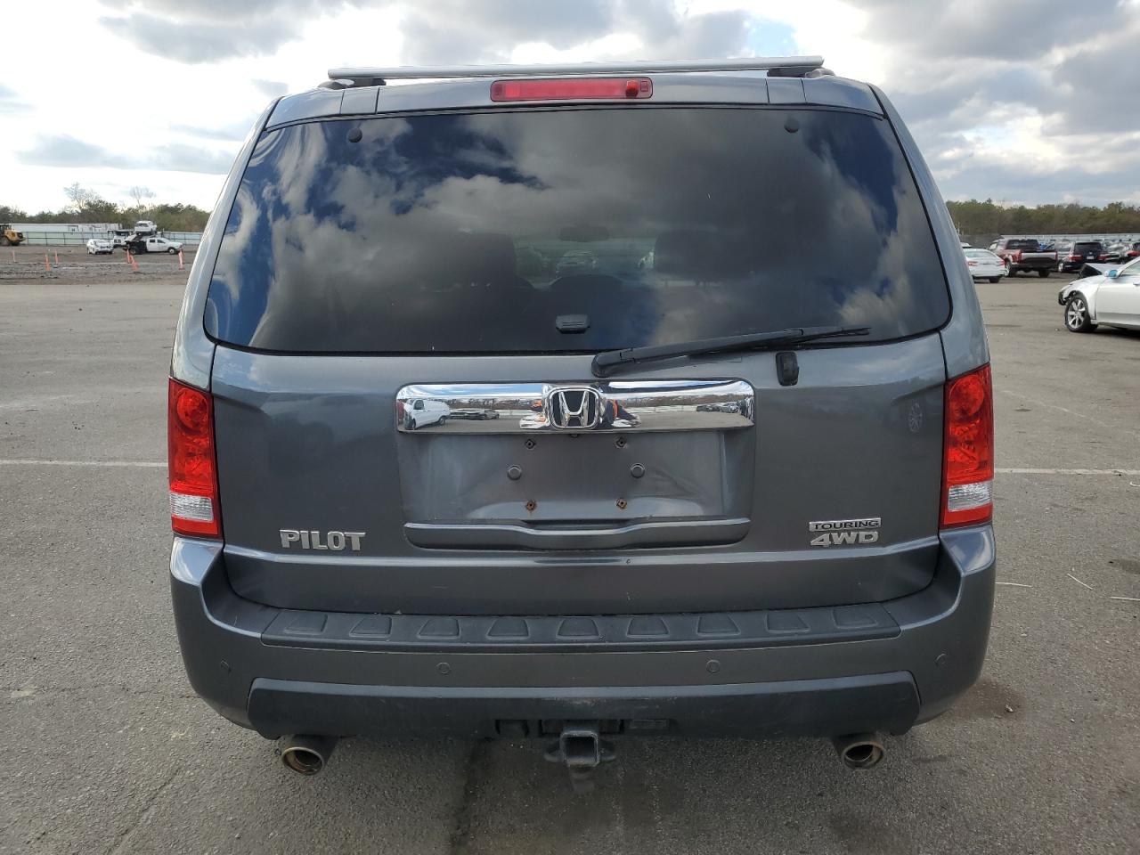 2011 Honda Pilot Touring VIN: 5FNYF4H9XBB018473 Lot: 83220684