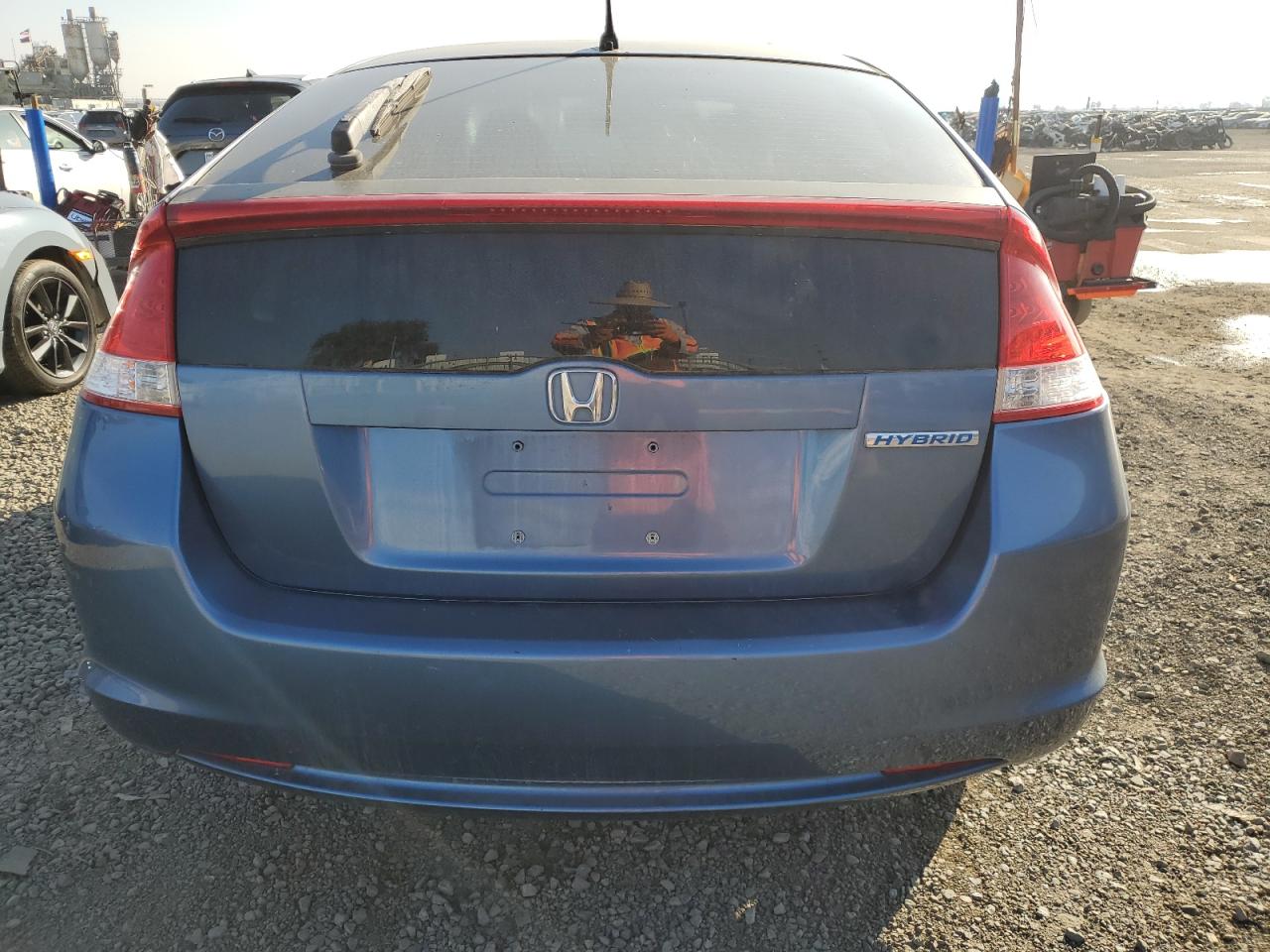 2010 Honda Insight Ex VIN: JHMZE2H77AS024404 Lot: 82923014