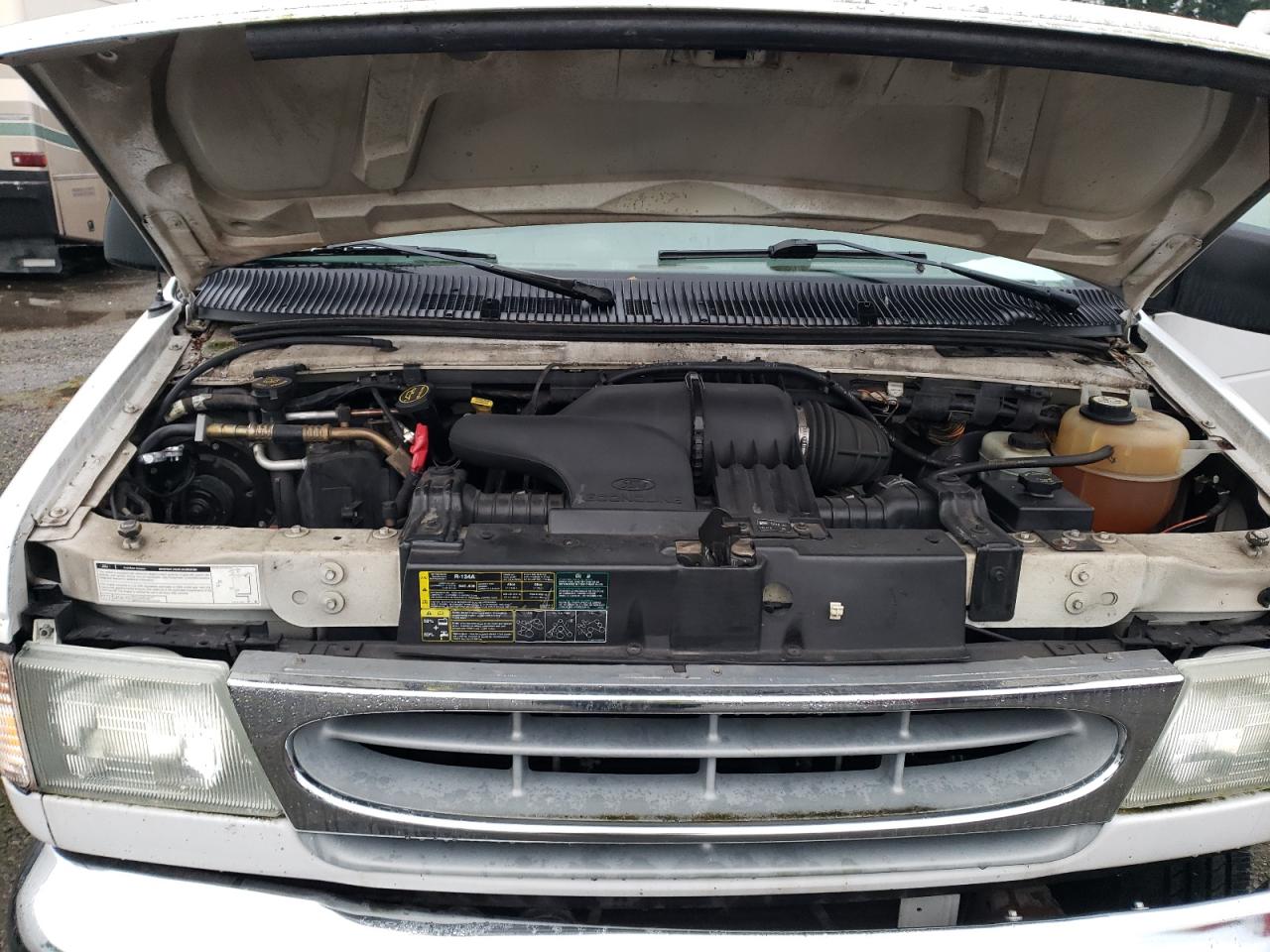 2002 Ford Econoline E350 Super Duty Wagon VIN: 1FBSS31L82HA61523 Lot: 84911784