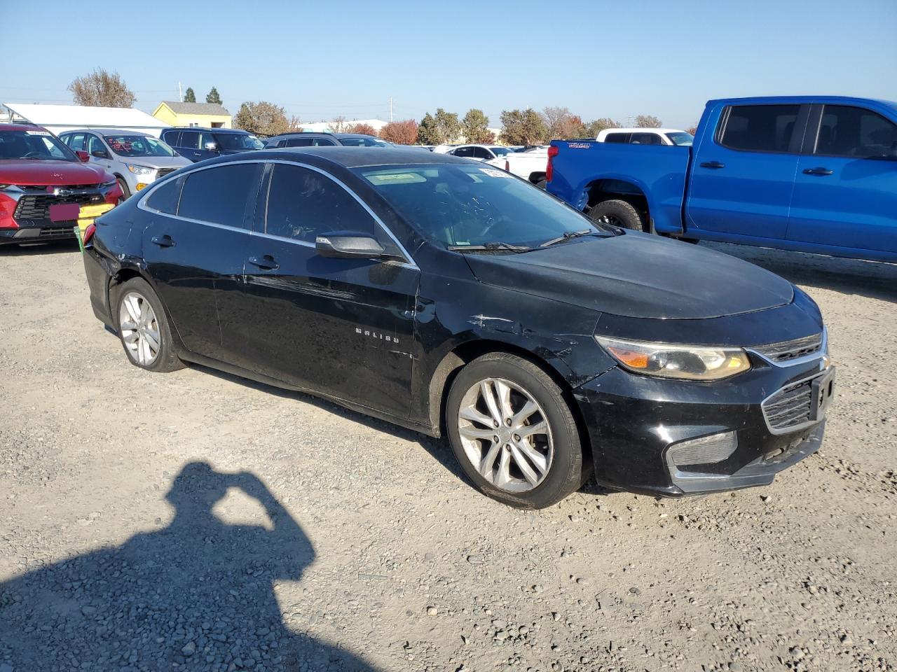 VIN 1G1ZE5ST3HF102715 2017 CHEVROLET MALIBU no.4