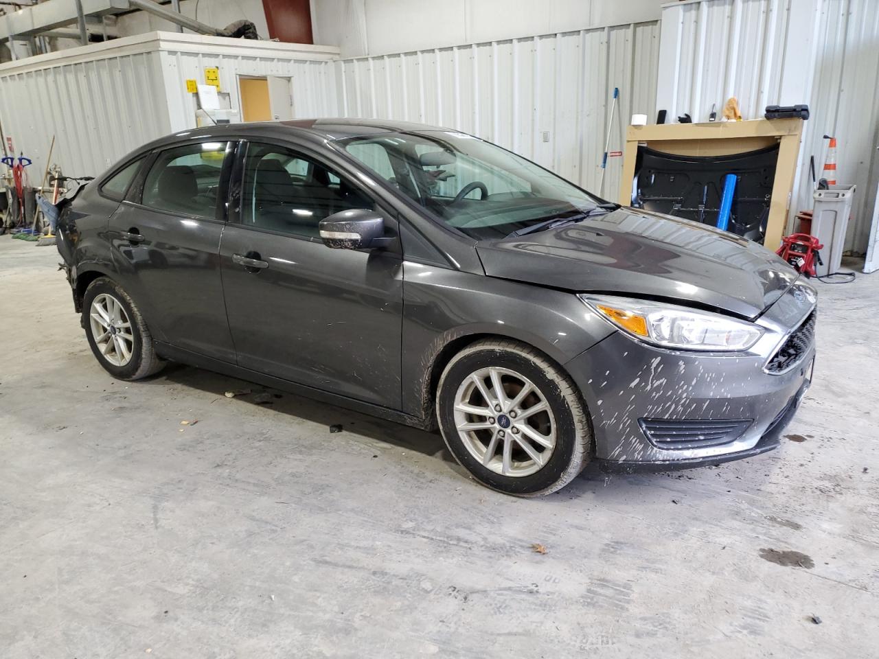 VIN 1FADP3F28FL377888 2015 FORD FOCUS no.4