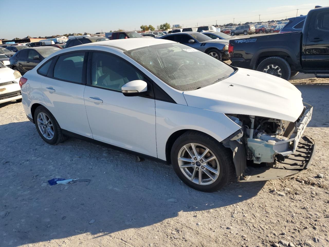 VIN 1FADP3F28HL218842 2017 FORD FOCUS no.4