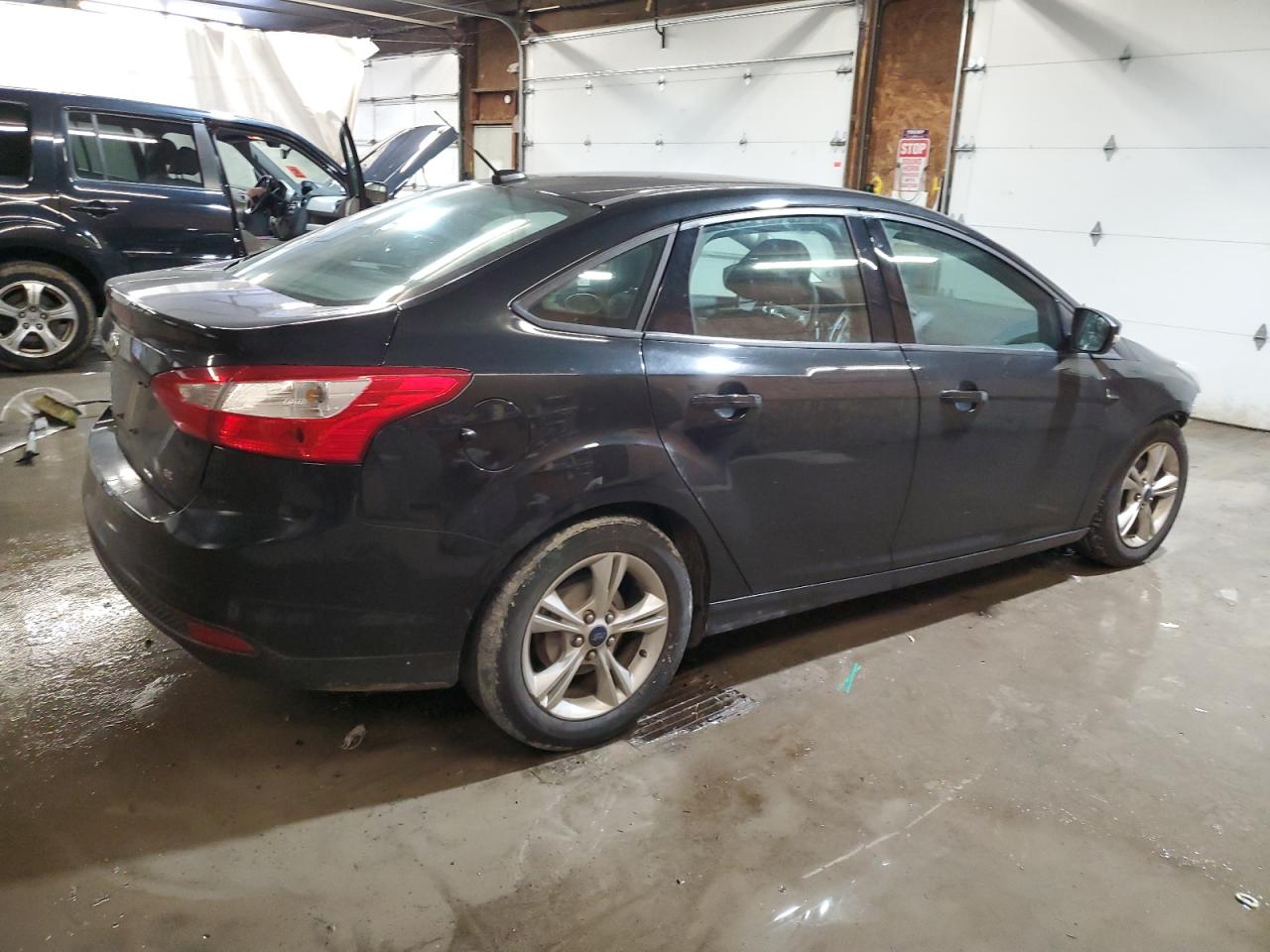 VIN 1FADP3F20EL428458 2014 FORD FOCUS no.3