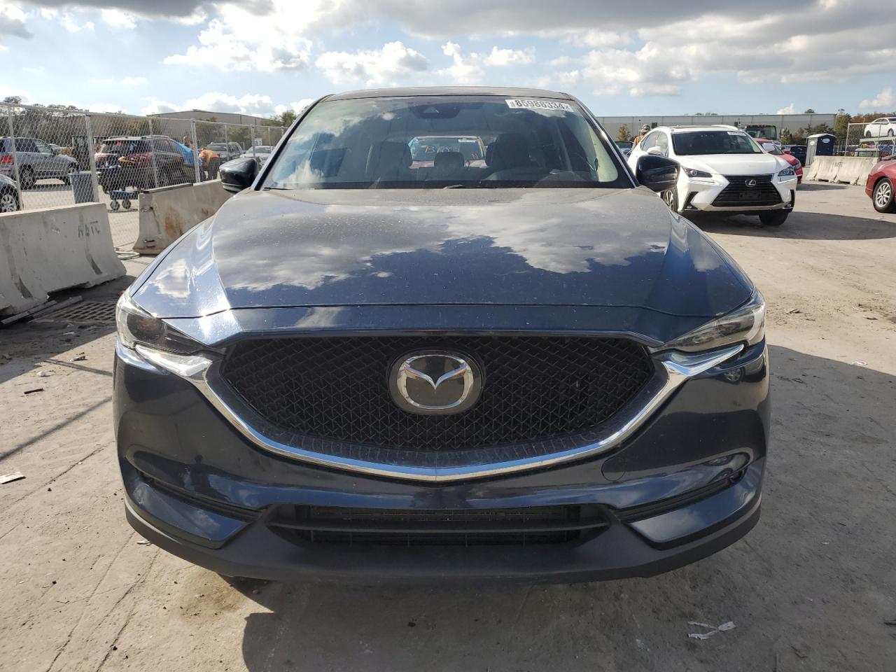 2021 Mazda Cx-5 Grand Touring Reserve VIN: JM3KFBAY8M0451326 Lot: 85988334