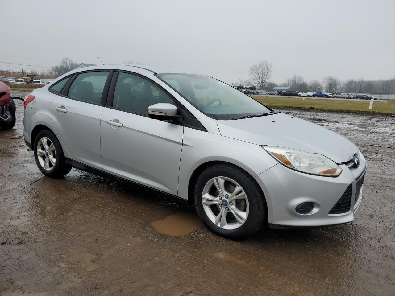 VIN 1FADP3F20DL114744 2013 FORD FOCUS no.4