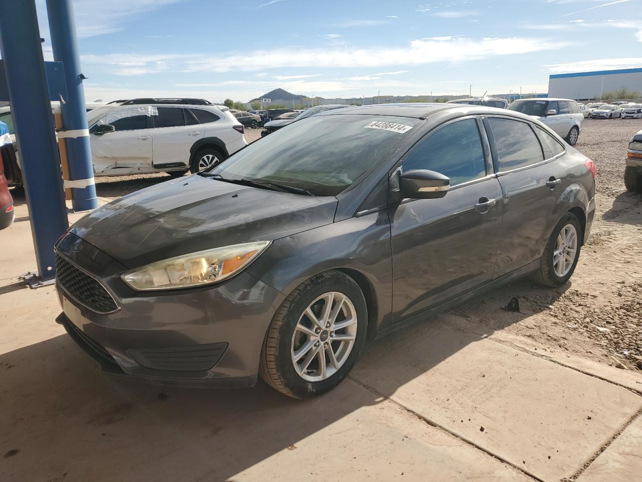 VIN 1FADP3F22GL214073 2016 FORD FOCUS no.1