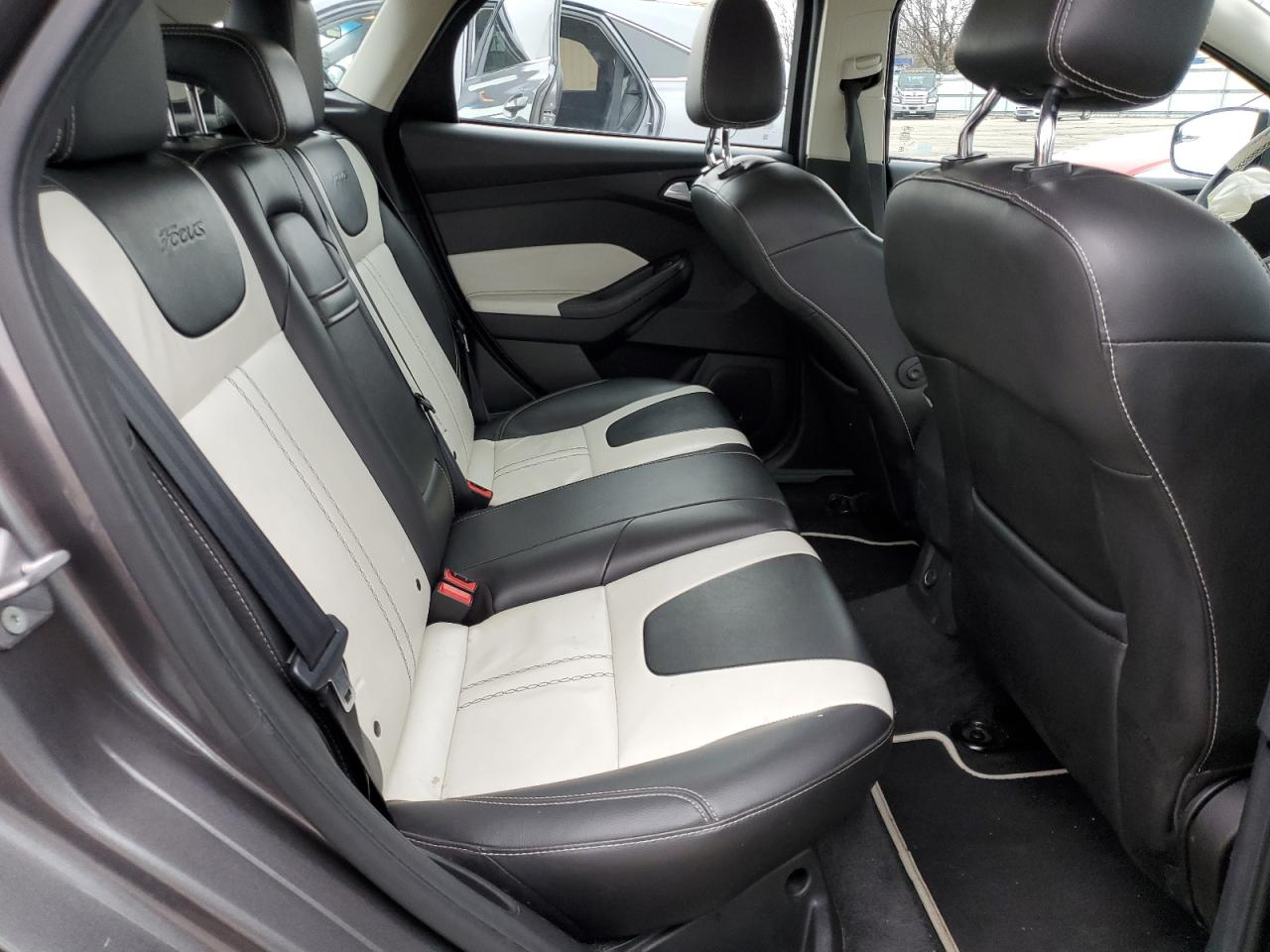 2012 Ford Focus Titanium VIN: 1FAHP3N29CL261856 Lot: 85870194