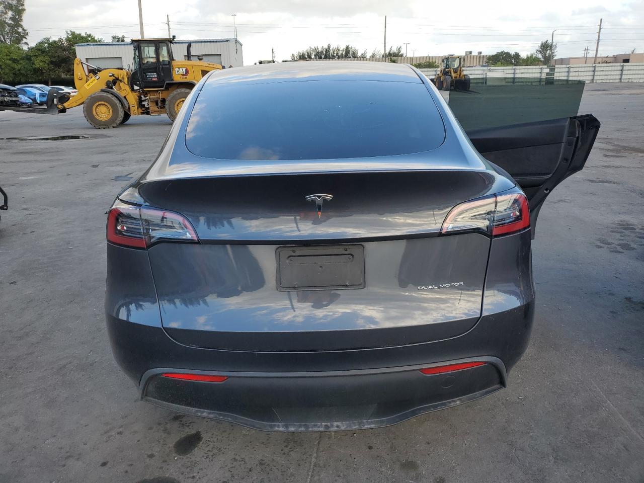 2023 Tesla Model Y VIN: 7SAYGDEE9PA118828 Lot: 84454884