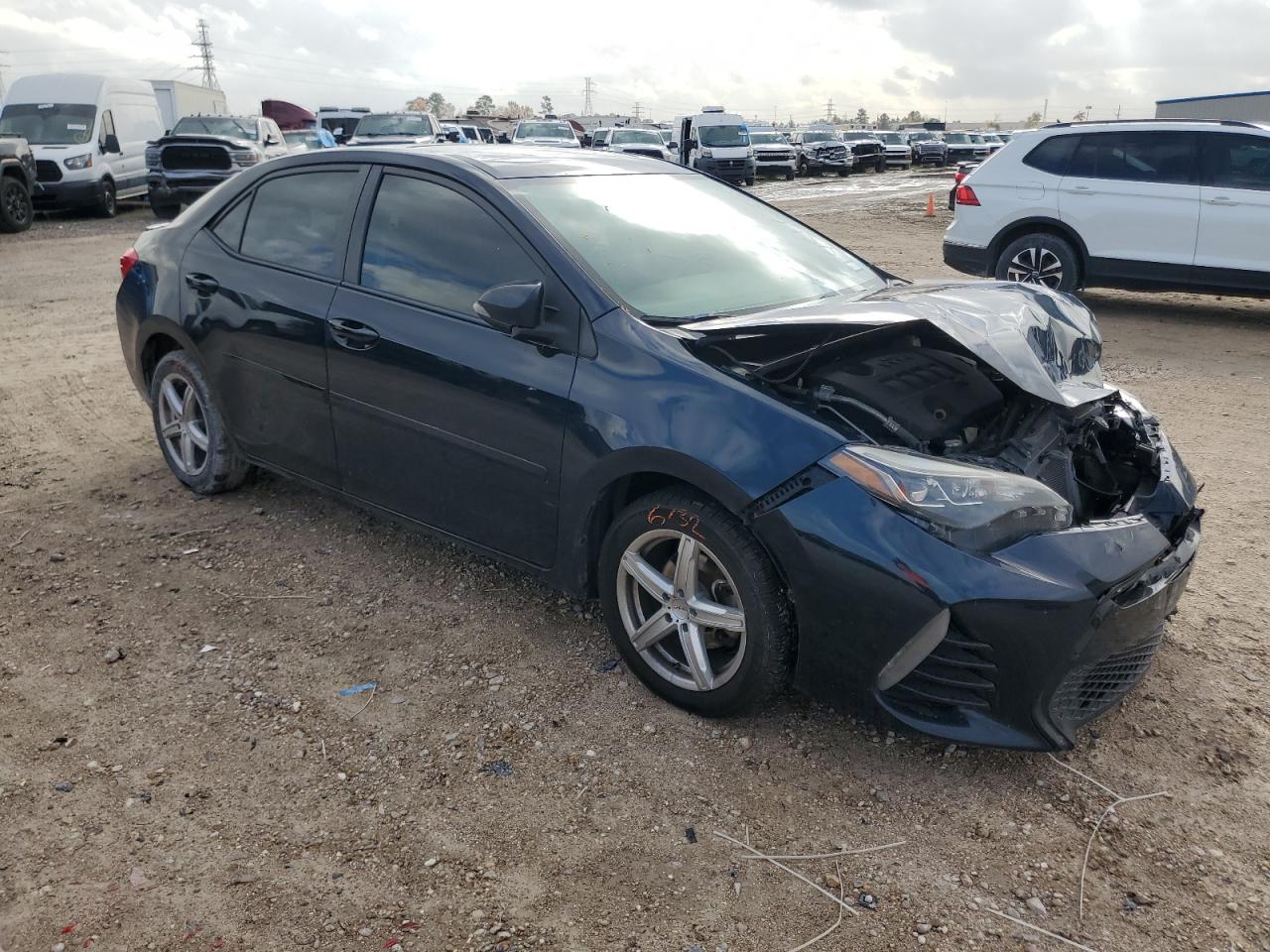 VIN 5YFBURHE2JP779829 2018 TOYOTA COROLLA no.4