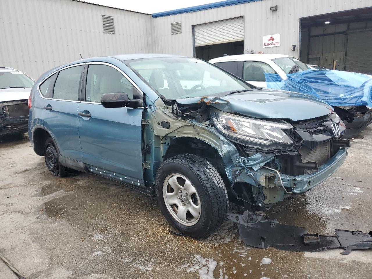 VIN 2HKRM3H3XFH530600 2015 HONDA CRV no.4