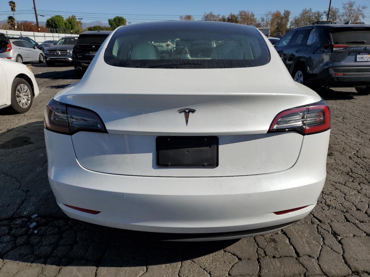 2021 Tesla Model 3 VIN: 5YJ3E1EA0MF100063 Lot: 85792444