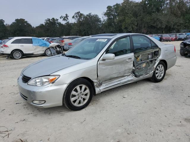 2004 Toyota Camry Le للبيع في Ocala، FL - Side