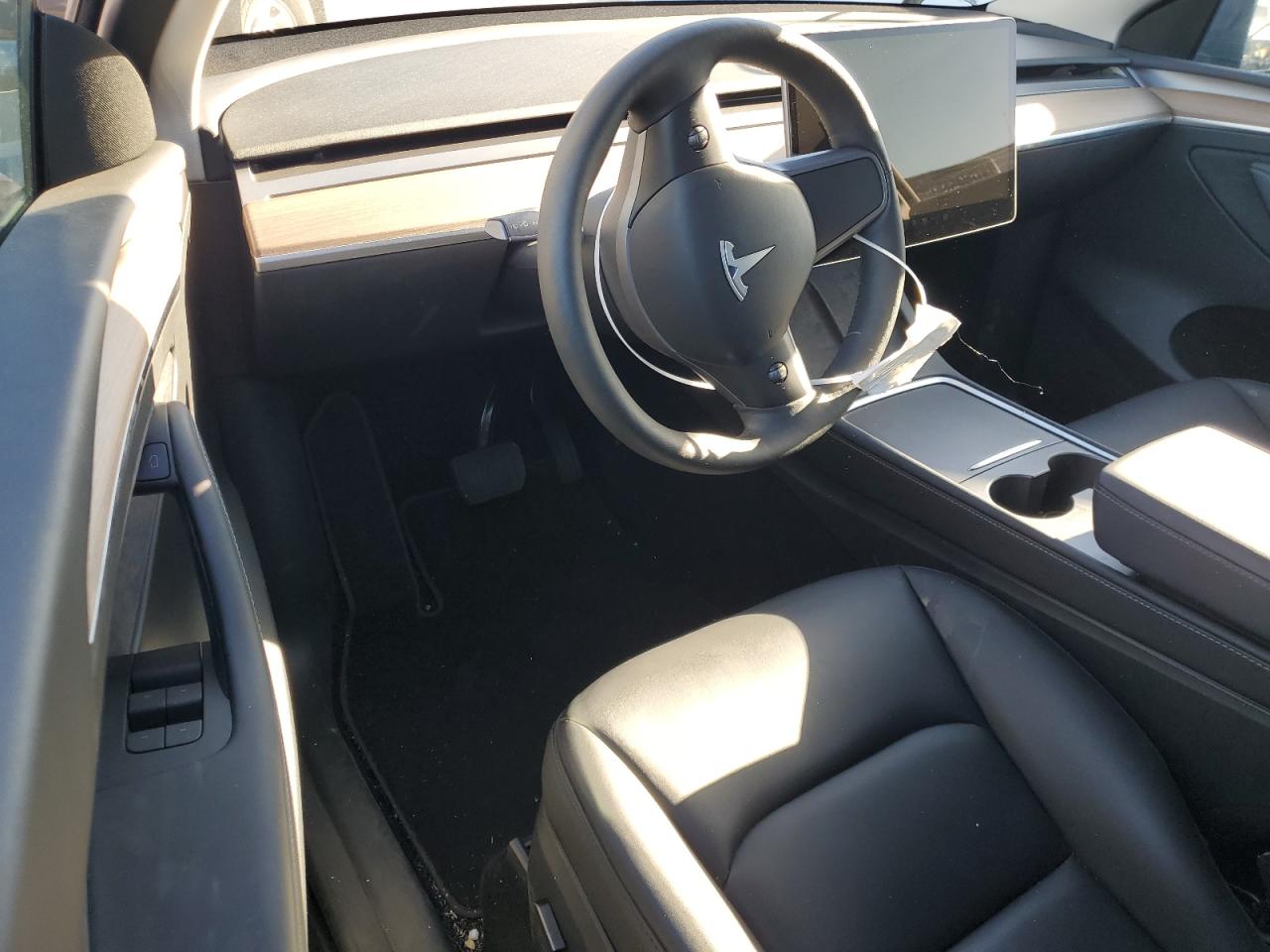 2023 Tesla Model Y VIN: 7SAYGDEE0PF899743 Lot: 82909604