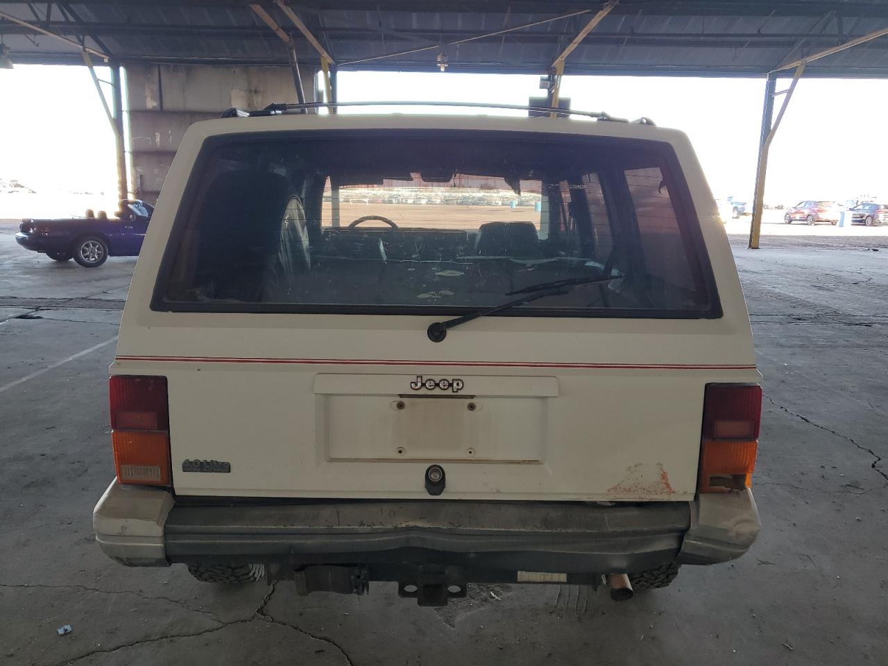 1992 Jeep Cherokee Laredo VIN: 1J4FJ58S1NL145977 Lot: 84543944