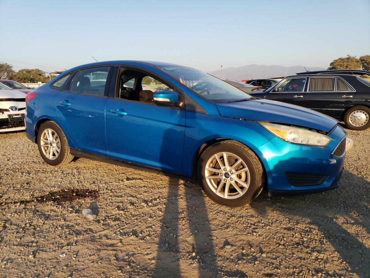 VIN 1FADP3F20FL228438 2015 FORD FOCUS no.4