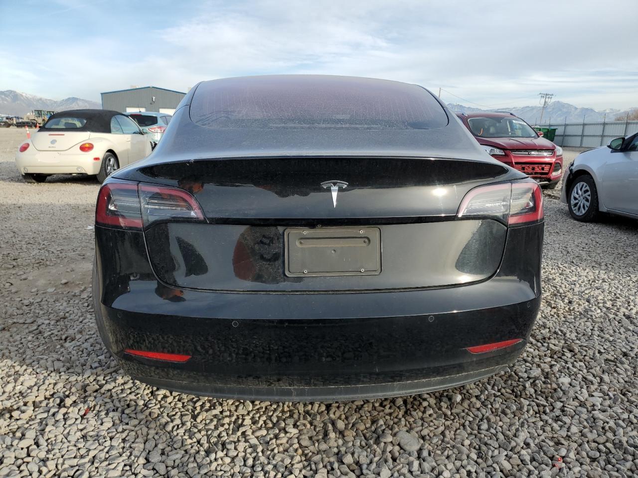 2019 Tesla Model 3 VIN: 5YJ3E1EA9KF323652 Lot: 84564104