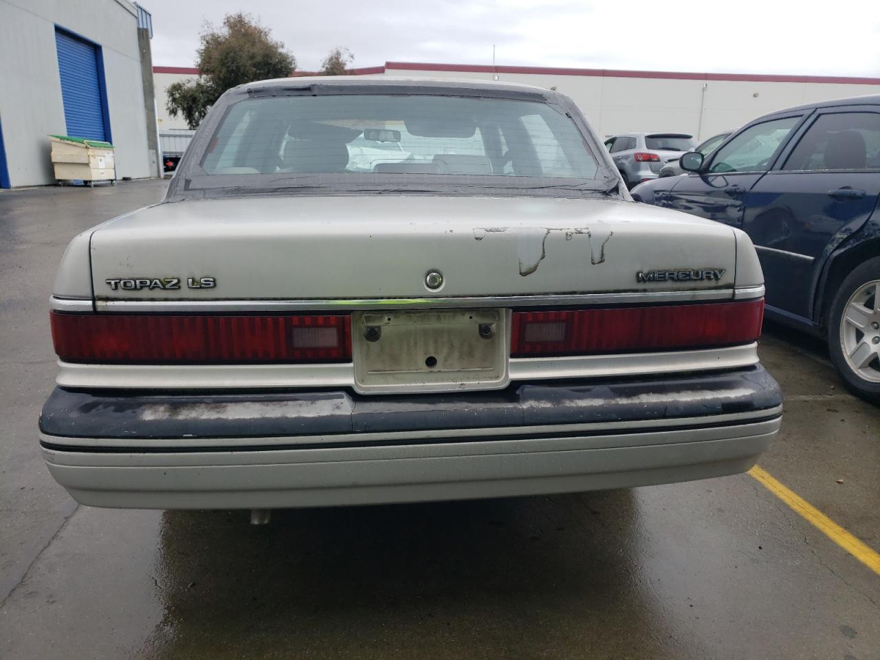 1991 Mercury Topaz Ls VIN: 1MEPM37X7MK619131 Lot: 86594204