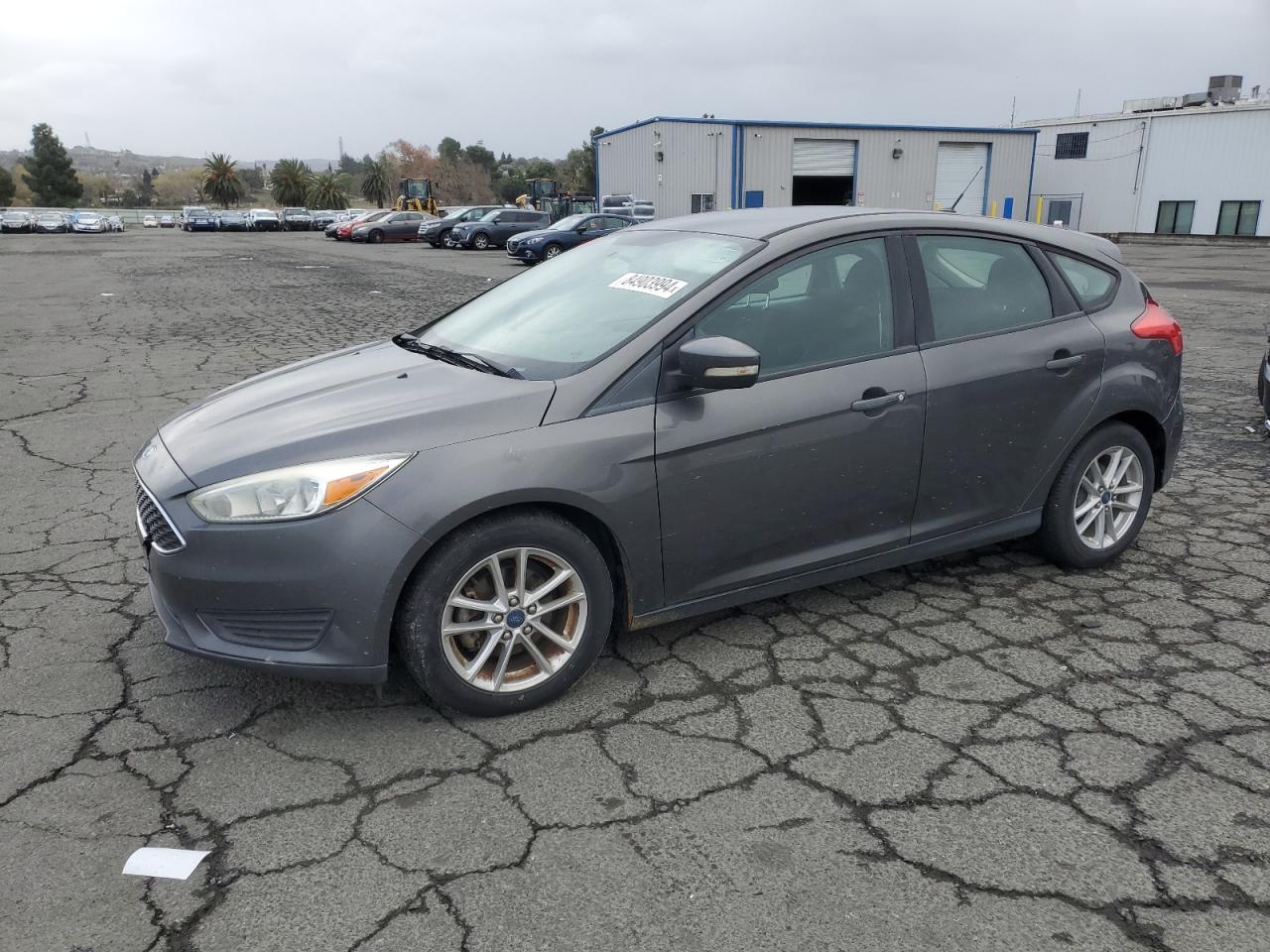 VIN 1FADP3K29FL307208 2015 FORD FOCUS no.1