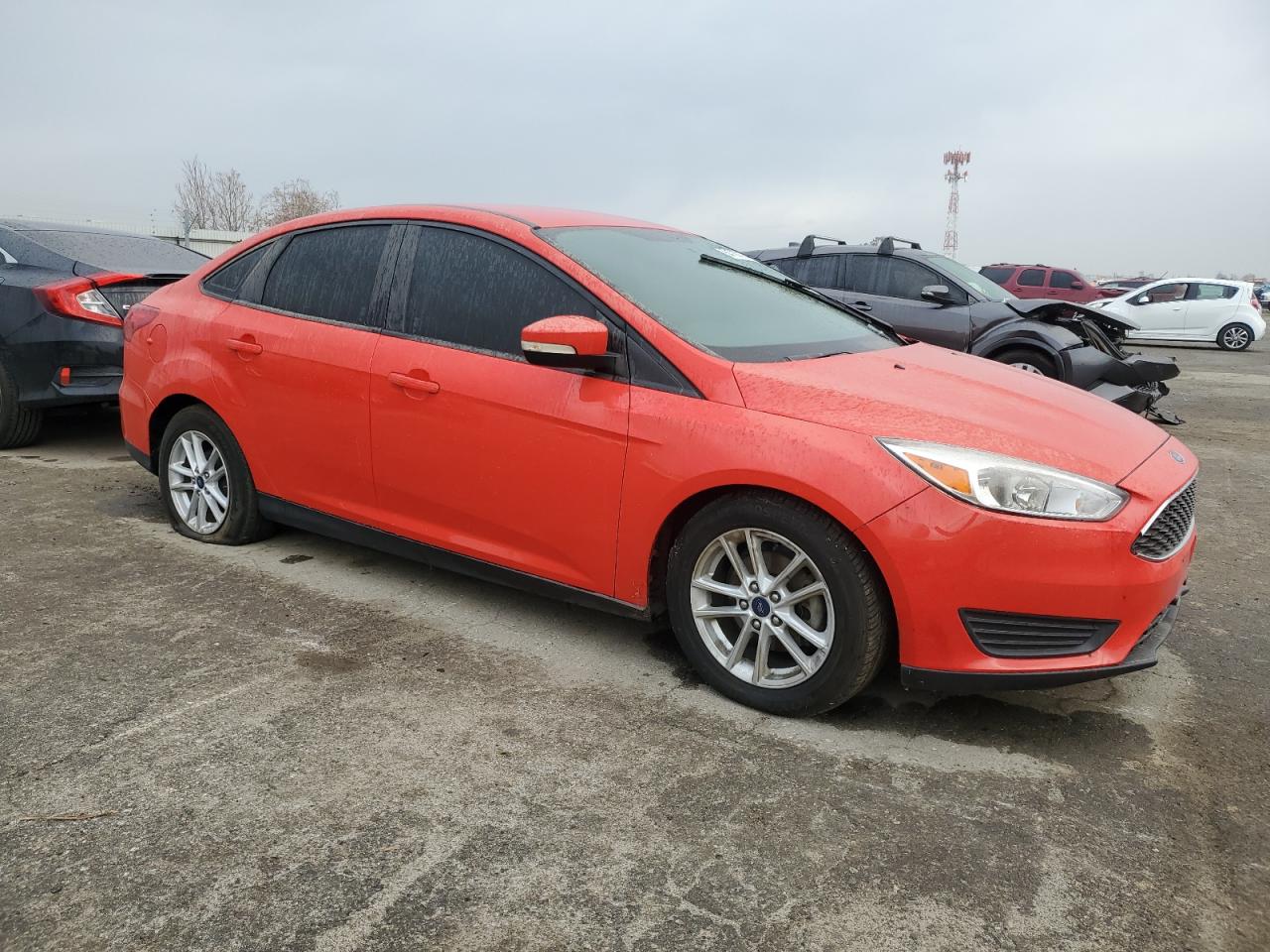 VIN 1FADP3F21HL300296 2017 FORD FOCUS no.4