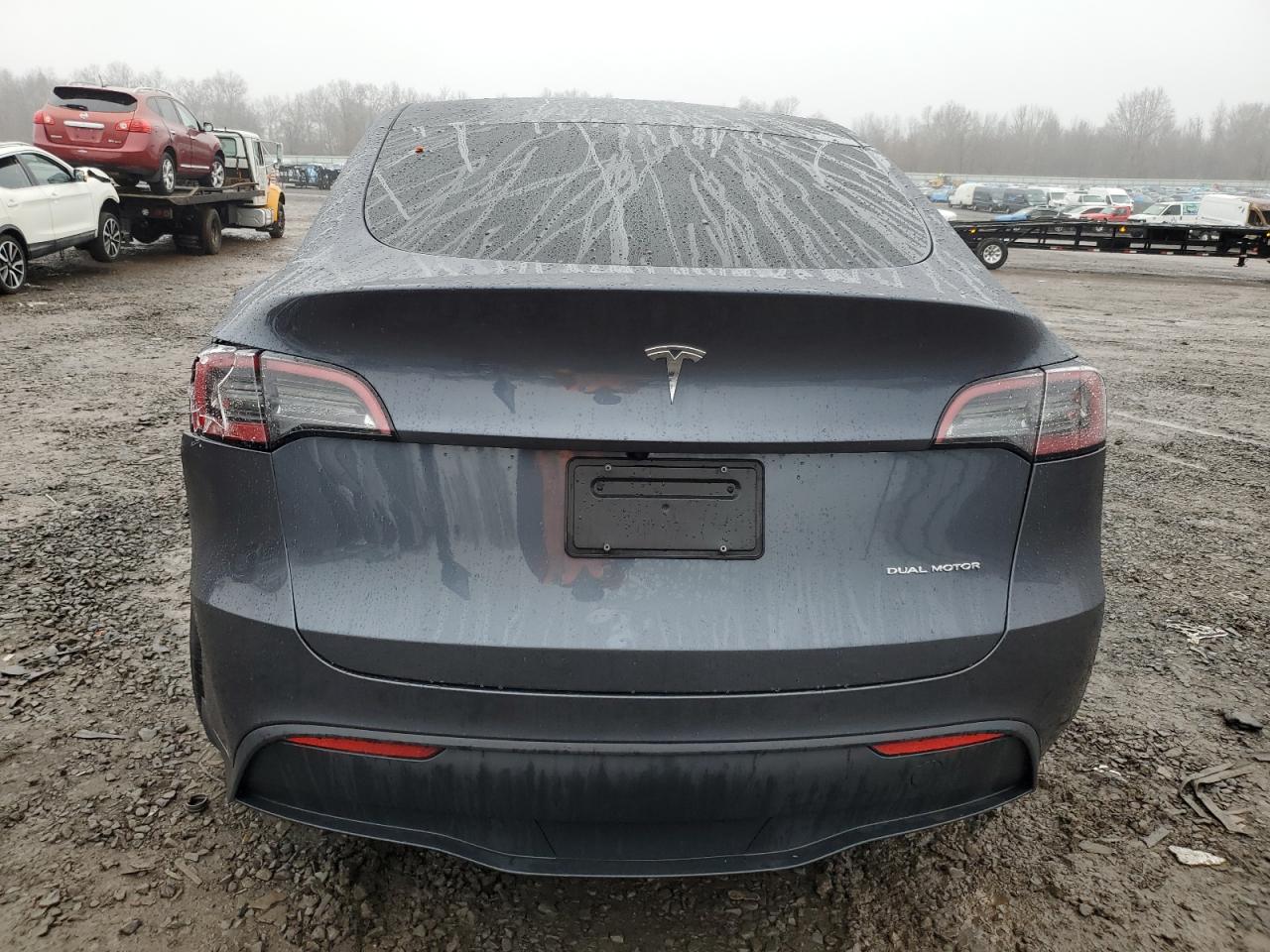 2023 Tesla Model Y VIN: 7SAYGDEE4PA136525 Lot: 84110284