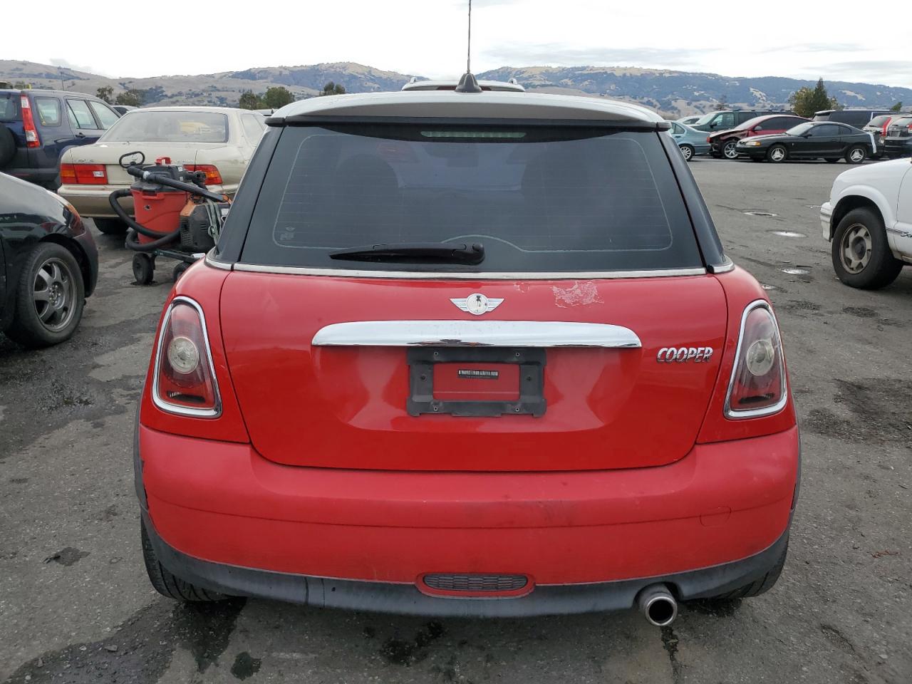 2009 Mini Cooper VIN: WMWMF33549TU70792 Lot: 60996495