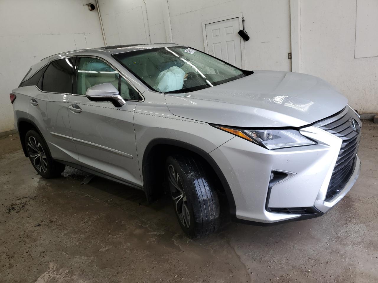 VIN 2T2ZZMCAXHC061264 2017 LEXUS RX350 no.4