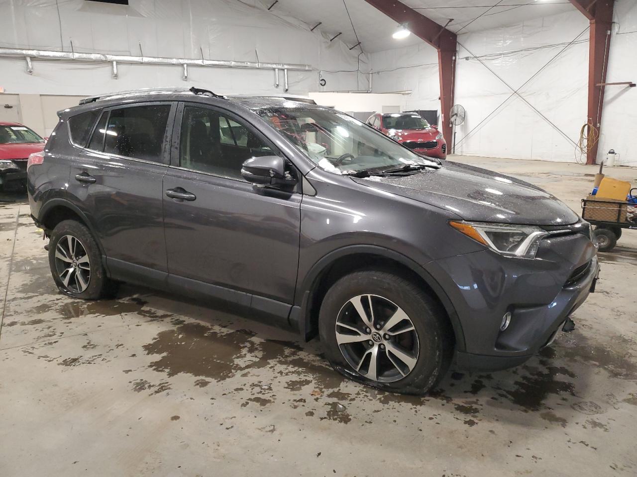 VIN JTMRFREV0HJ147228 2017 TOYOTA RAV4 no.4