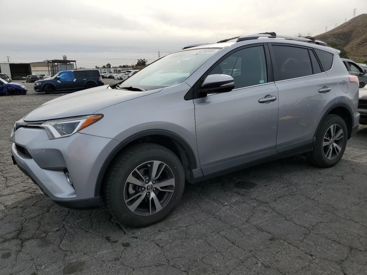 VIN 2T3WFREV7GW253338 2016 TOYOTA RAV4 no.1