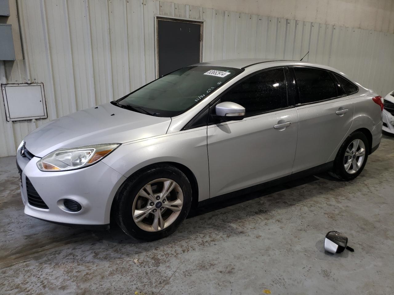 VIN 1FADP3F21EL175733 2014 FORD FOCUS no.1