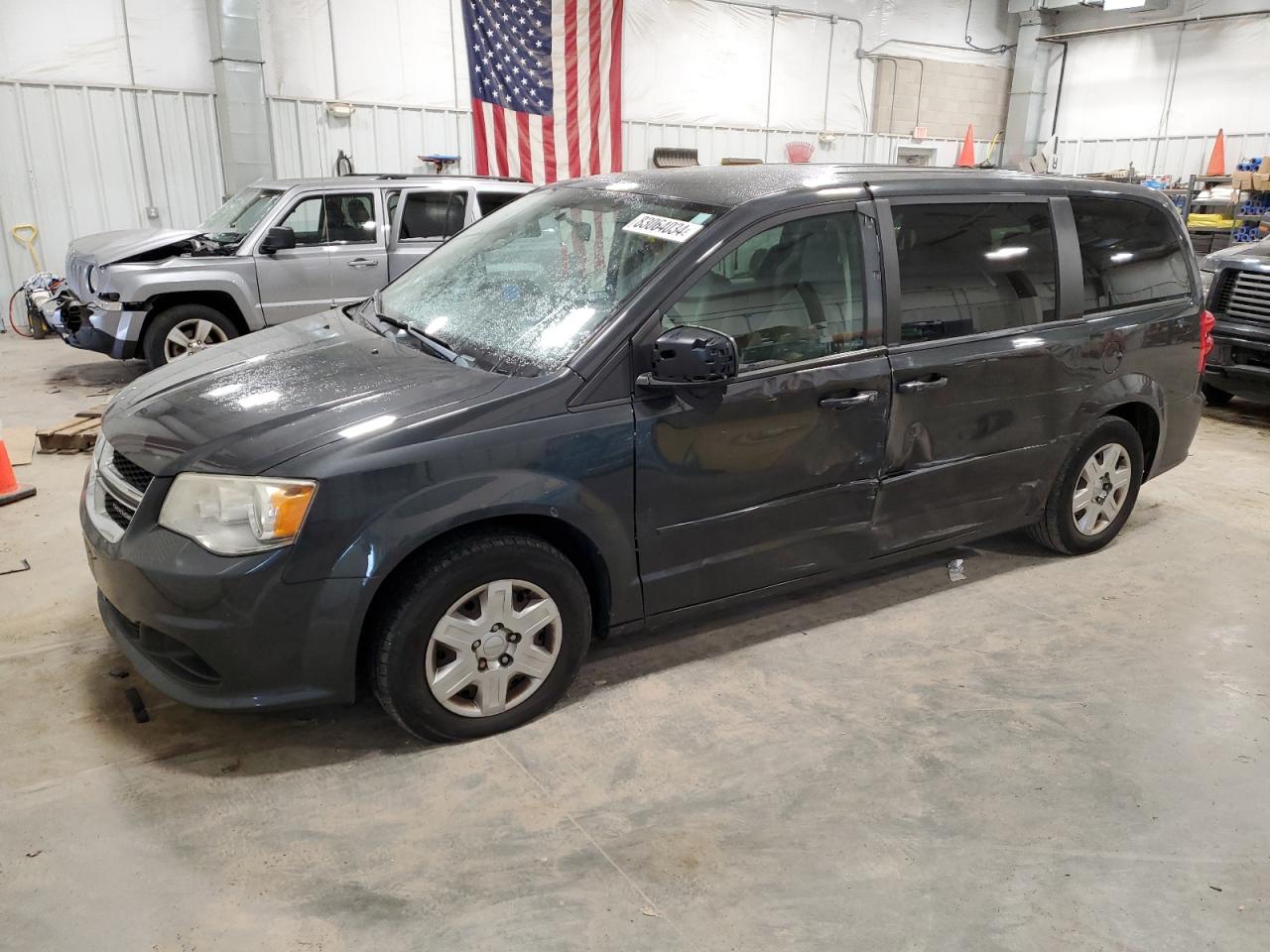 2012 Dodge Caravan - Image 1