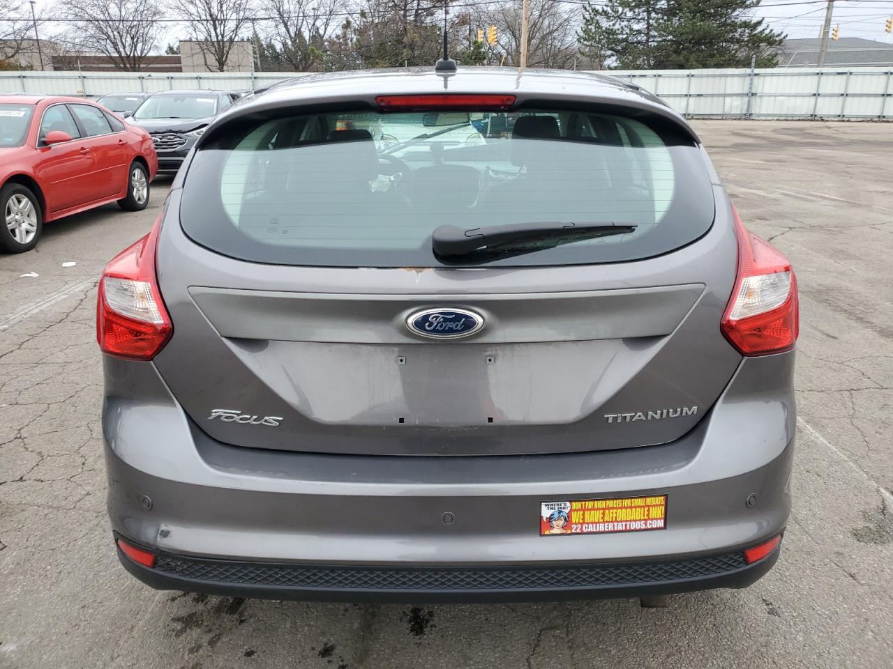 2012 Ford Focus Titanium VIN: 1FAHP3N29CL261856 Lot: 85870194