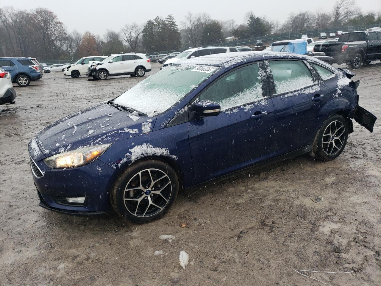 VIN 1FADP3H2XHL322357 2017 FORD FOCUS no.1