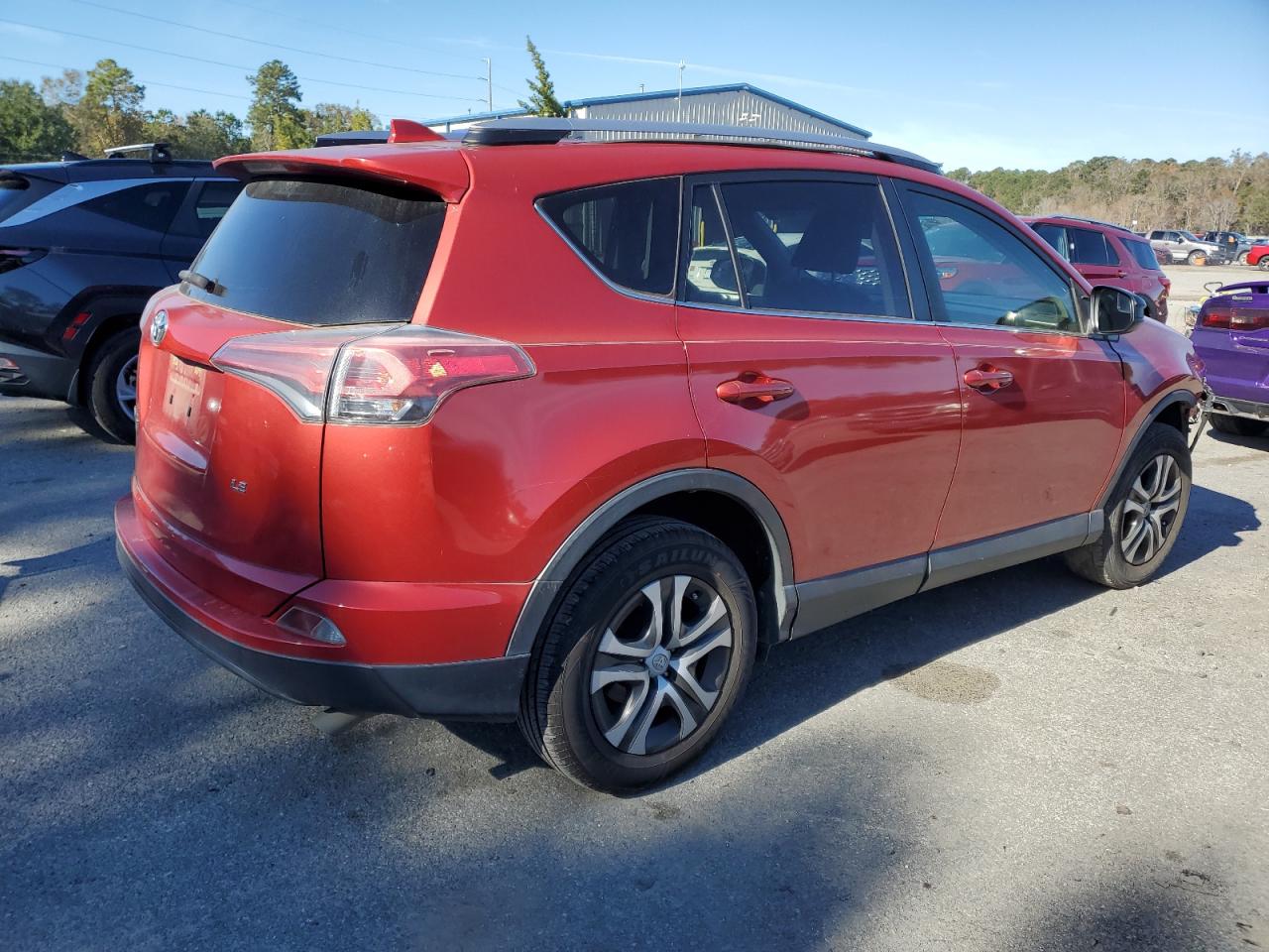2017 Toyota Rav4 Le red null gas JTMZFREV9HJ133120 photo #4