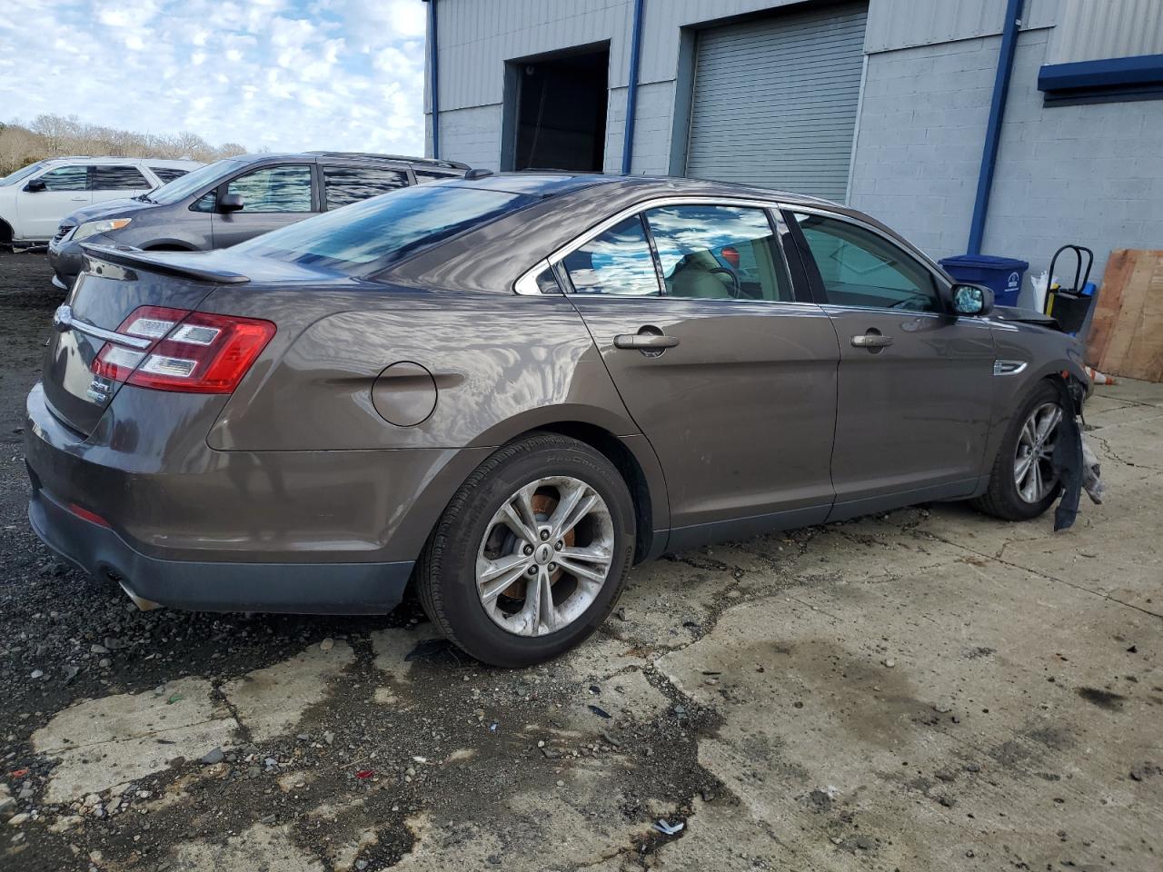 2015 Ford Taurus Sel VIN: 1FAHP2H83FG180116 Lot: 86832414