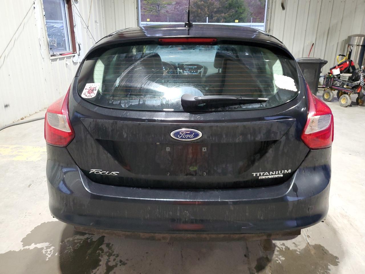 2014 Ford Focus Titanium VIN: 1FADP3N24EL131534 Lot: 90575285