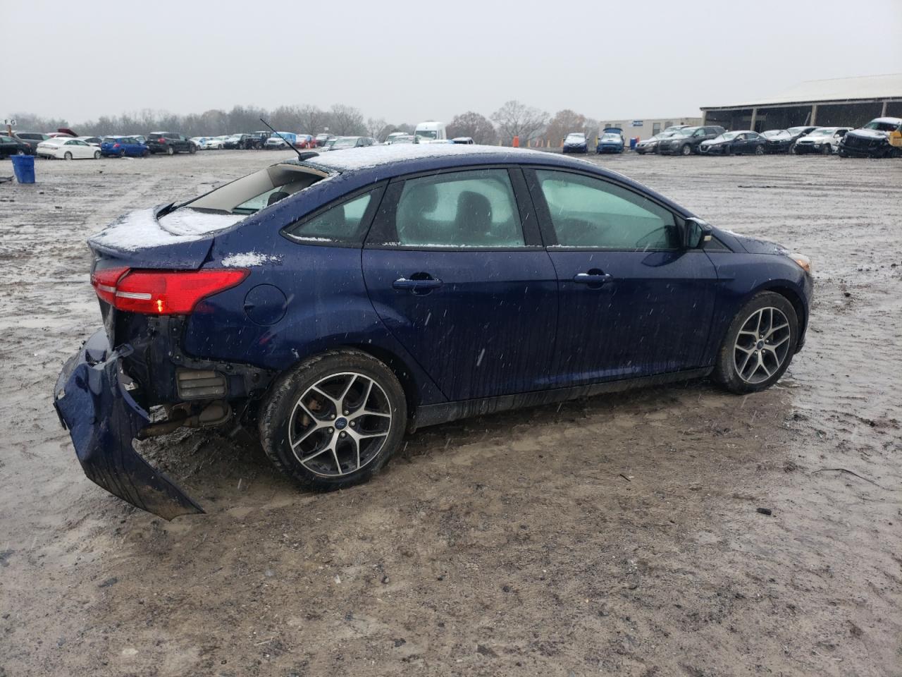 VIN 1FADP3H2XHL322357 2017 FORD FOCUS no.3