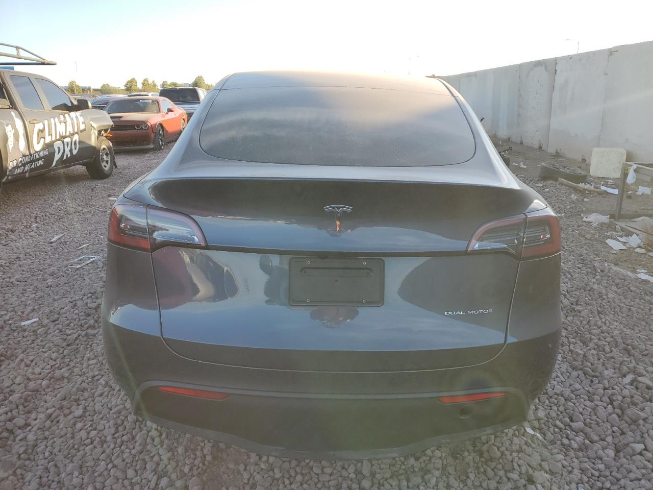 2023 Tesla Model Y VIN: 7SAYGDEE6PF860607 Lot: 82810114