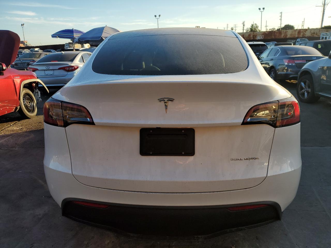 2023 Tesla Model Y VIN: 7SAYGDEE7PA104684 Lot: 84904974