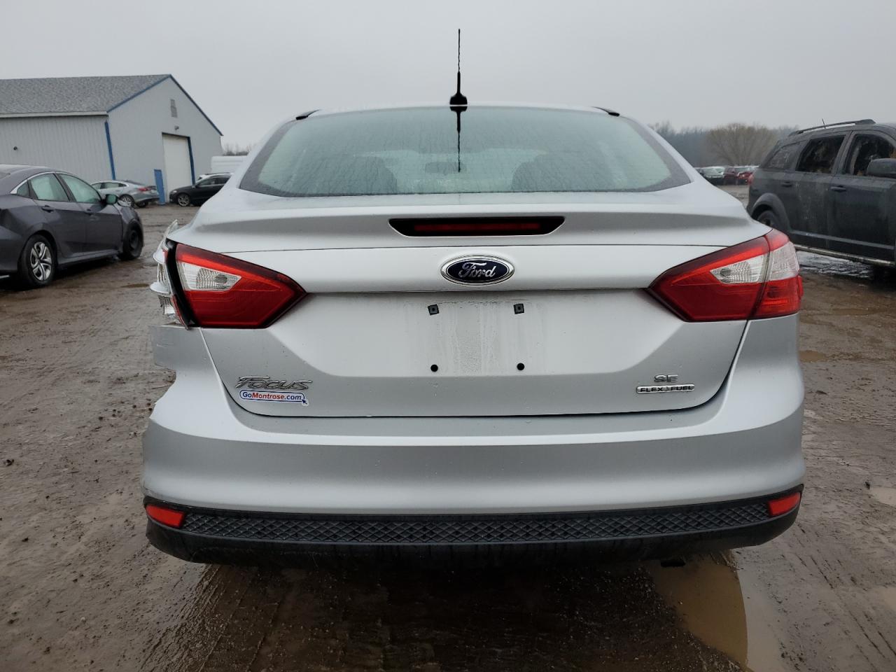 VIN 1FADP3F20DL114744 2013 FORD FOCUS no.6