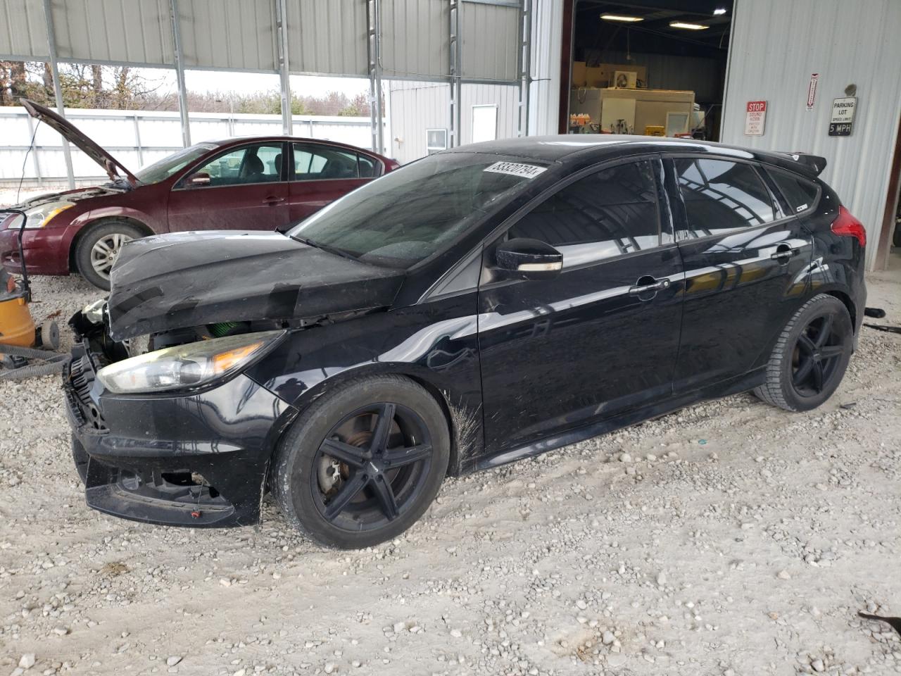 VIN 1FADP3L9XGL228367 2016 FORD FOCUS no.1