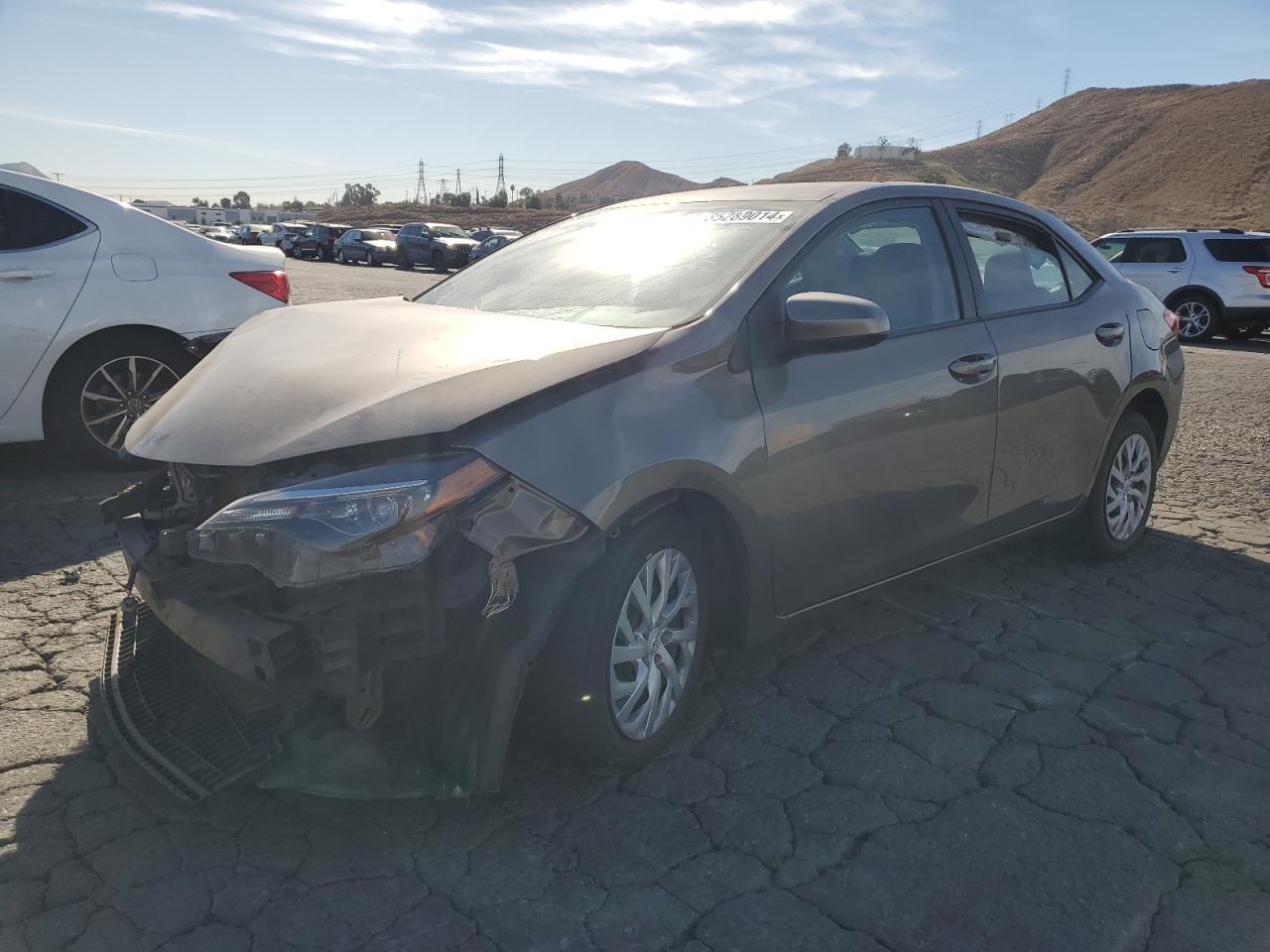 VIN 5YFBURHE4KP900734 2019 TOYOTA COROLLA no.1