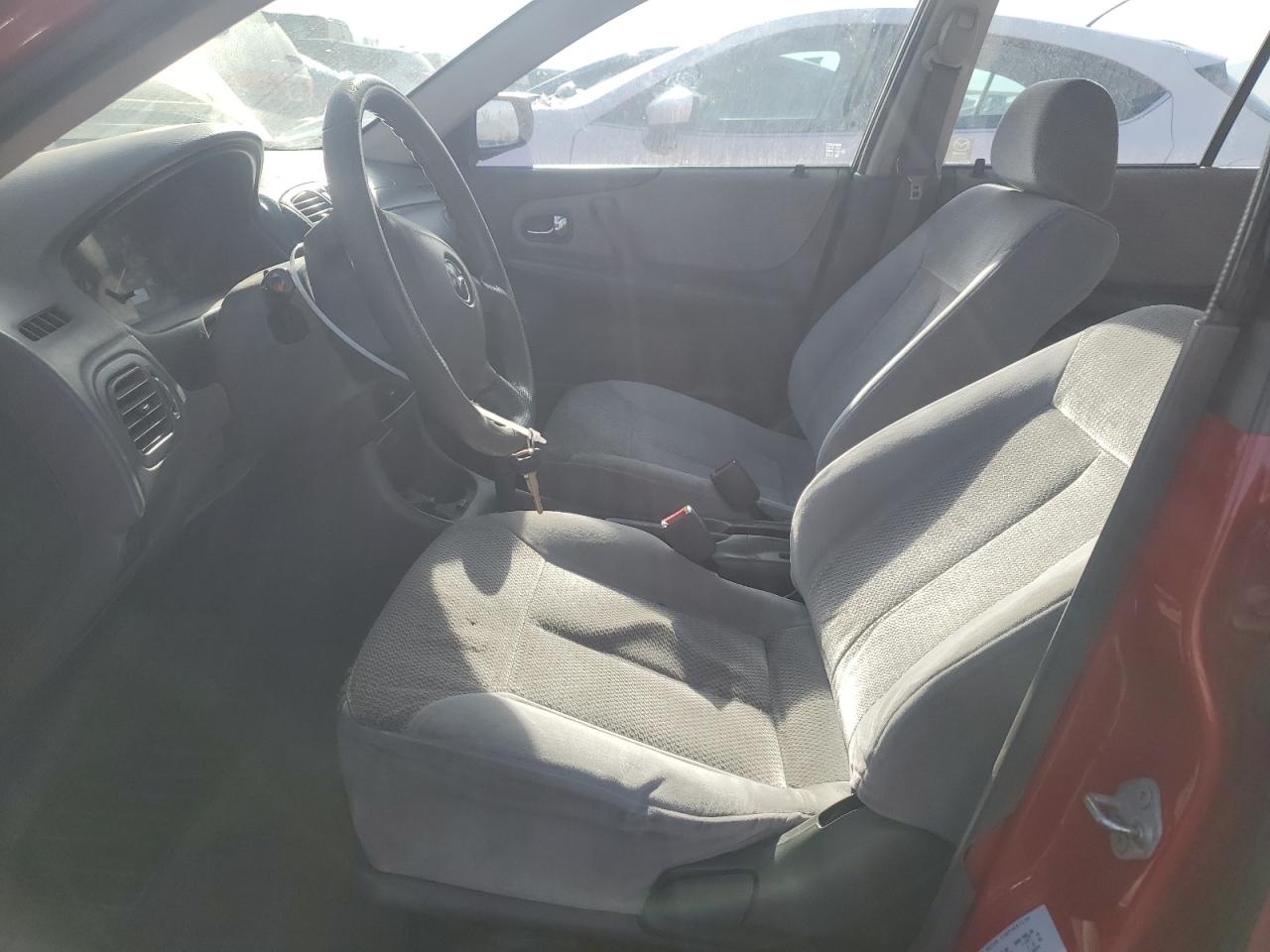 2000 Mazda Protege Dx VIN: JM1BJ2225Y0309023 Lot: 85962334