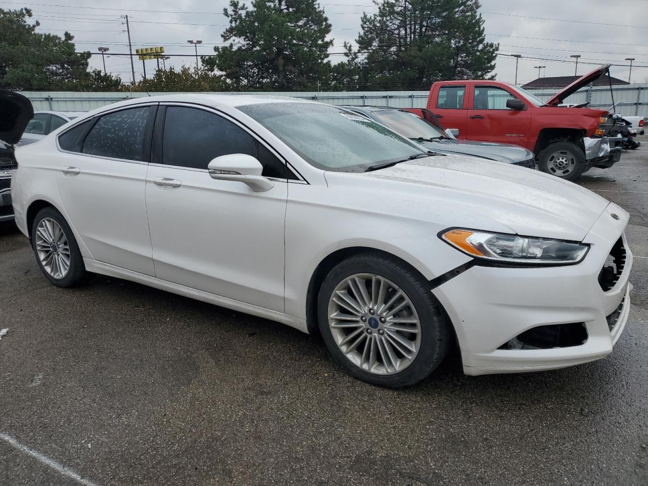 VIN 3FA6P0HD0GR212765 2016 FORD FUSION no.4